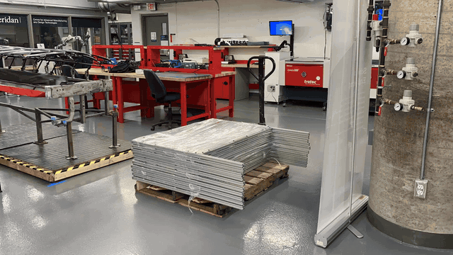 Timelapse of finished POS shield kits stacking up on the production floor