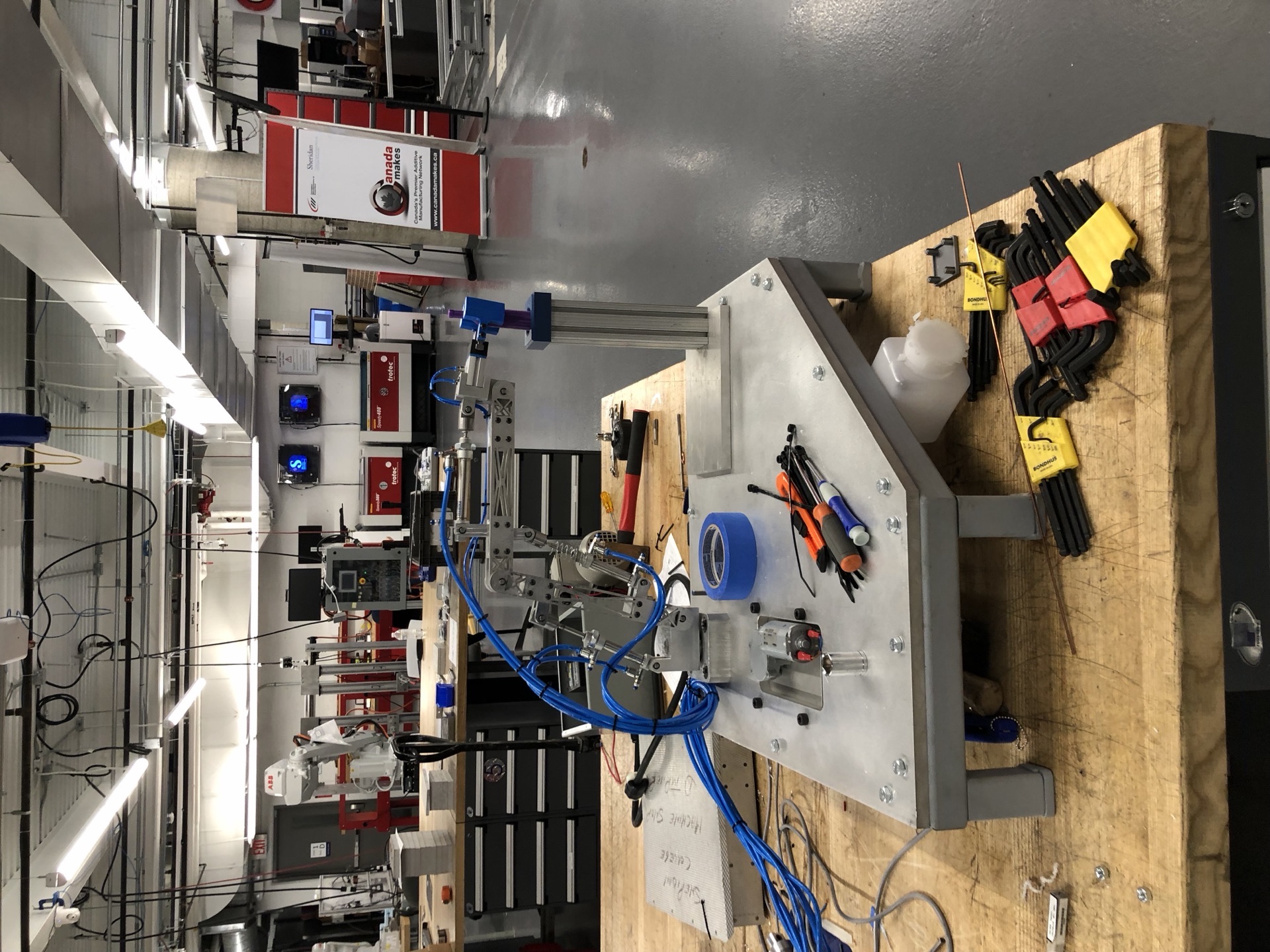 Wide shot of the validation lab with multiple competition stations laid out