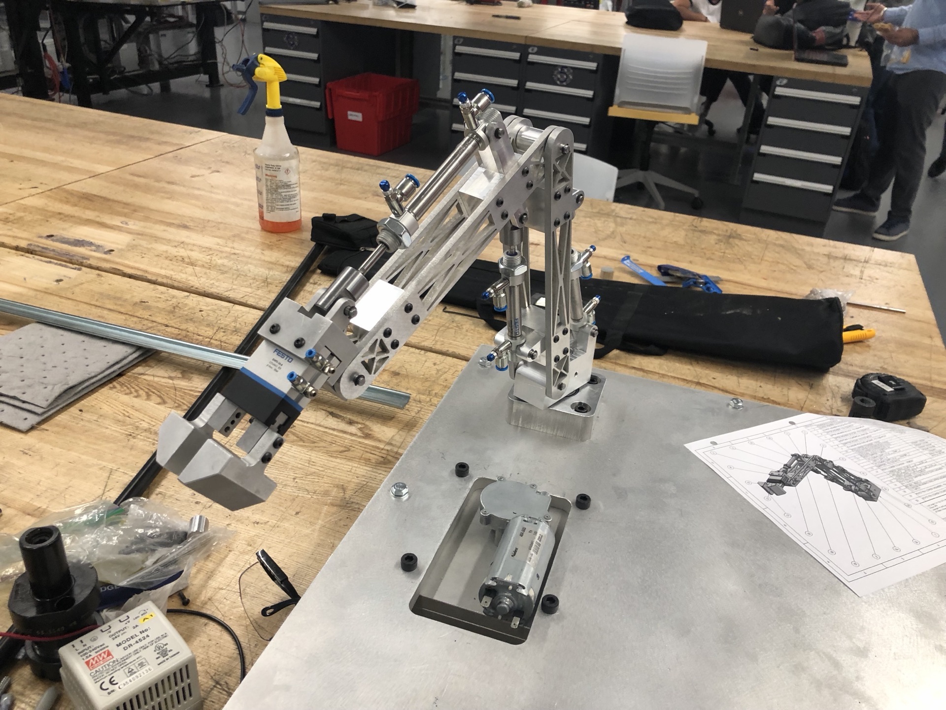 Polymechanics arm mid-build on the lab workbench