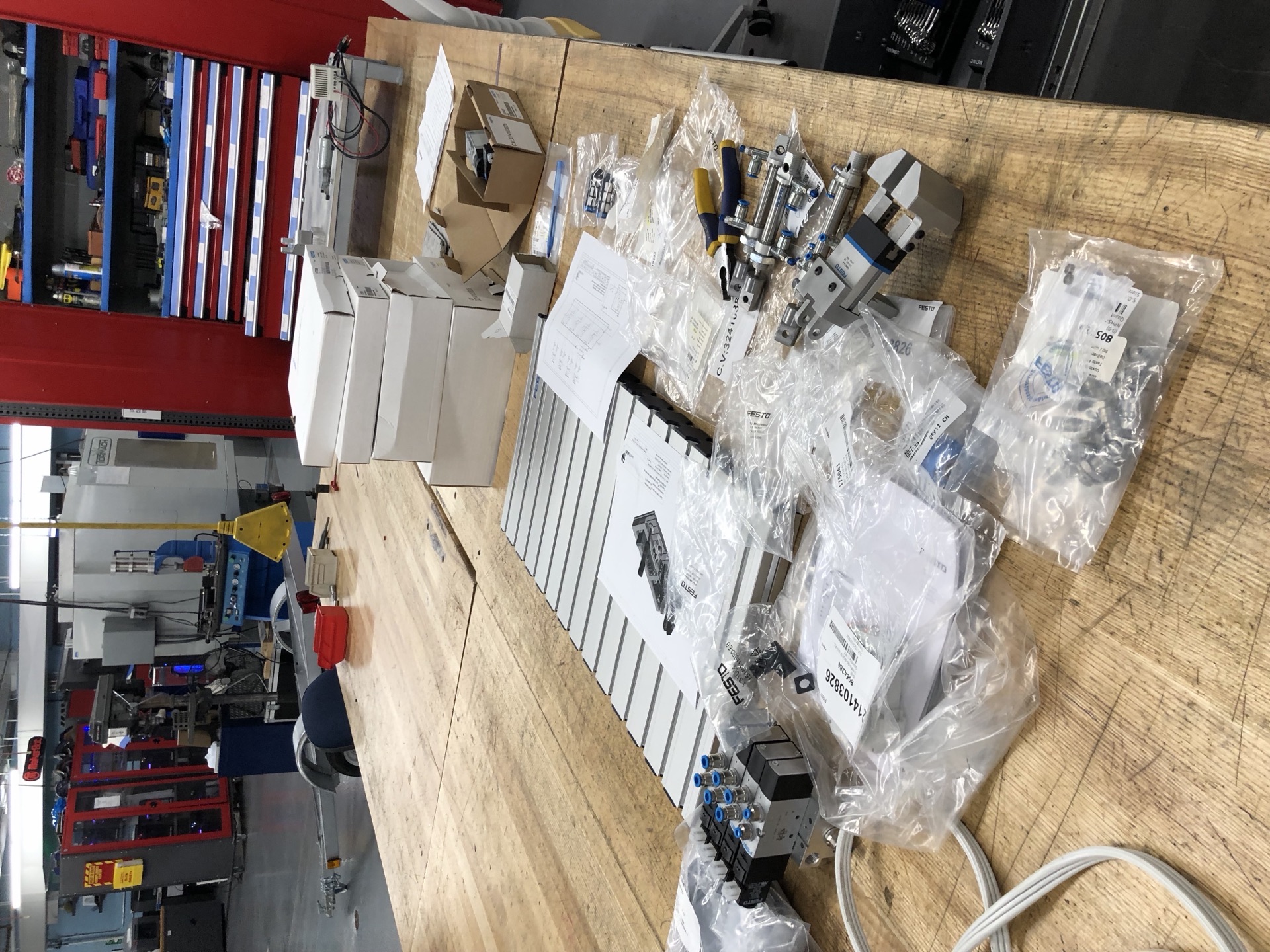 Polymechanics pneumatic kit components laid out for inspection